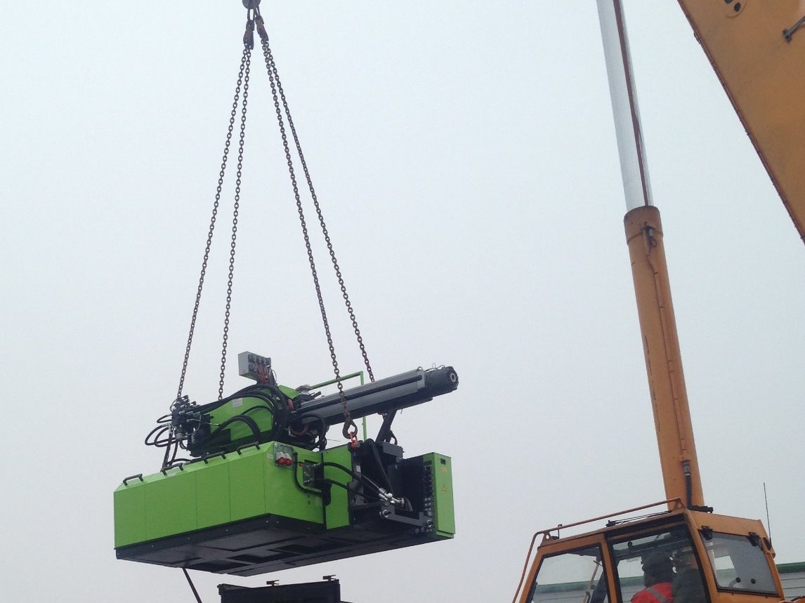 Crane loading injection moulder