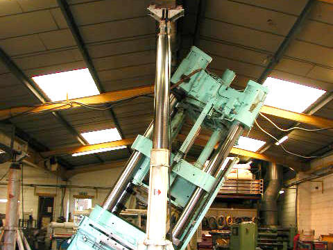 Hydraulic gantry tilting a press for installation
